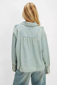 Free People Tattered And Ruffled Denim Top in vintage tint wash - women's blouse - detail view
