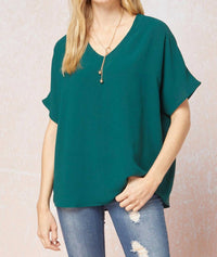entro Solid V-neck Top in hunter green - women's blouse