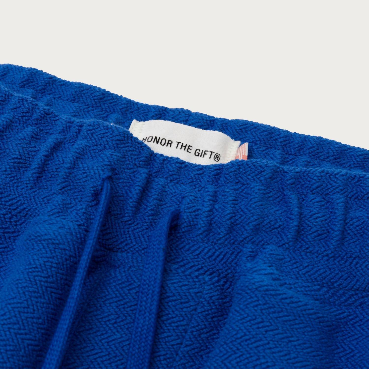 HONOR THE GIFT Men's Race Herringbone Short in blue - men's shorts - detail view