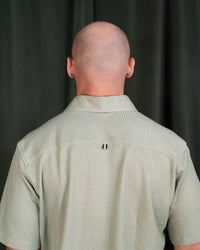 Stone Rose - Men's Technical Pique Button Down Shirt