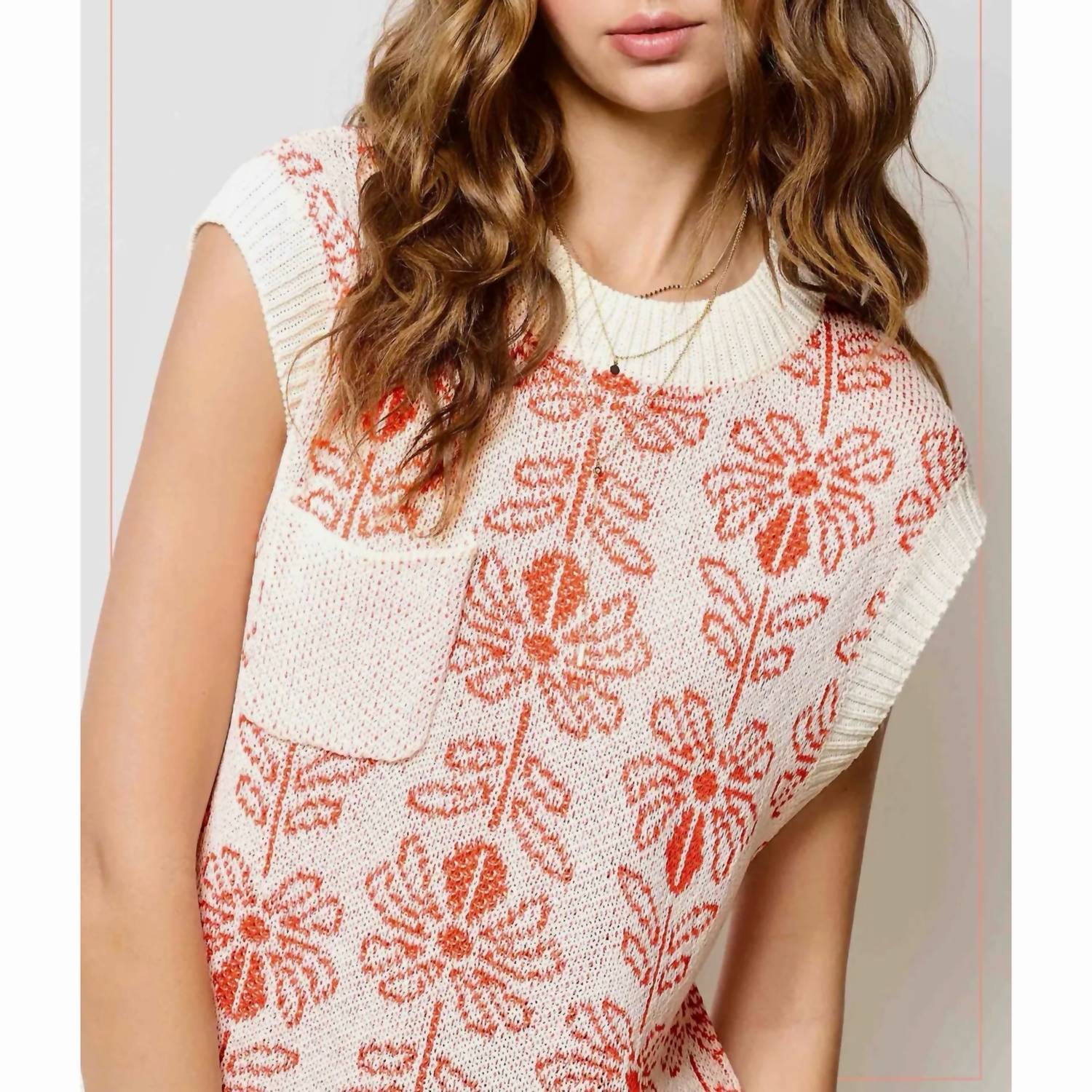 LA MIEL Floral Knit Sweater Vest in burnt orange - women's jacket - detail view