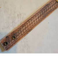 A Rare Bird Women's Hand Tooled Leather Bracelet in brown - women's jewelry - detail view