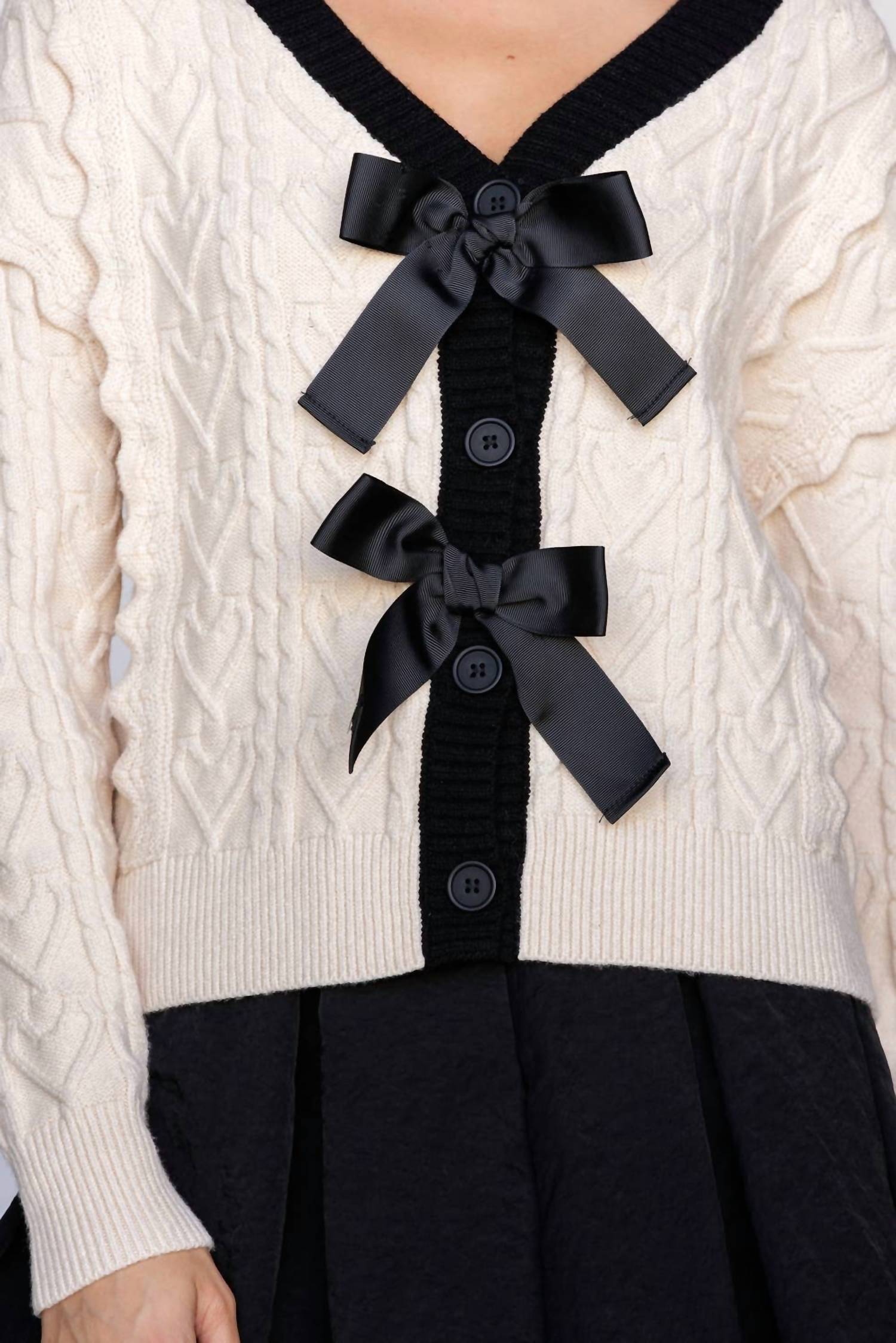 Storia - CABLE KNIT CARDIGAN WITH BOWS