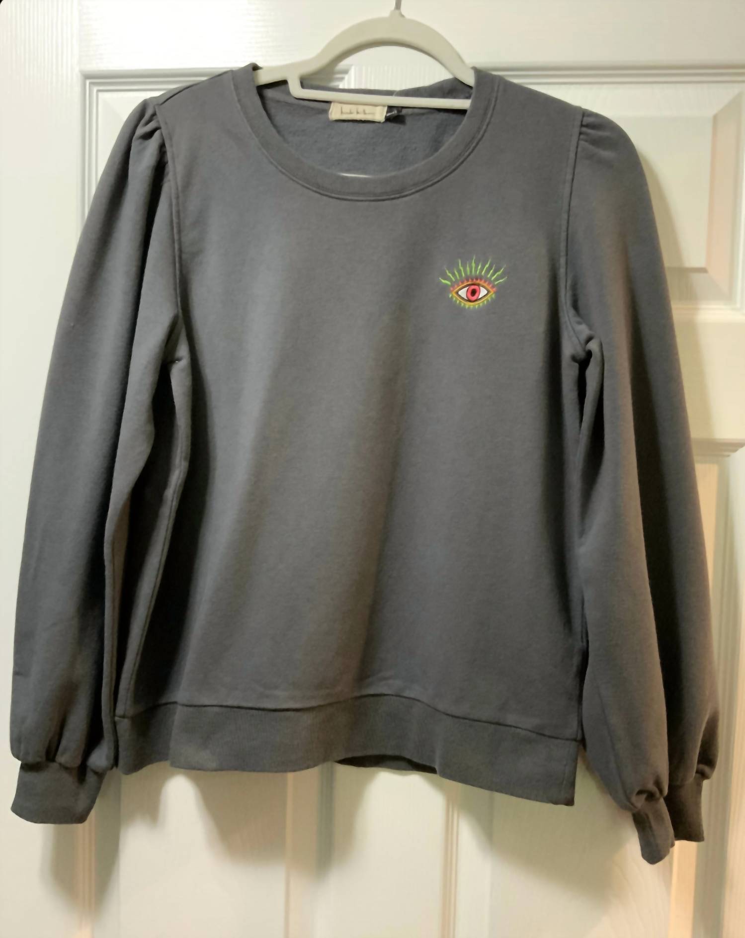 Nicole Miller - WOMEN EVIL EYE CREWNECK SWEATSHIRT