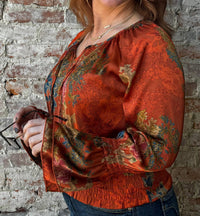 PAPARAZZI Print Shirred Peasant Top in rust - women's blouse - detail view