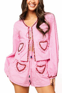 QUEEN OF SPARKLES Gingham Ruffle Heart Pocket Shorts in pink and white - women's shorts - detail view