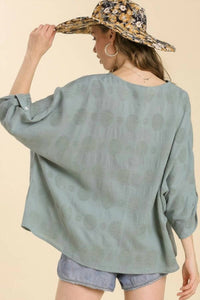 umgee Polka Dot Detail V-neck Top With Adjustable Sleeves in mint - women's blouse - detail view