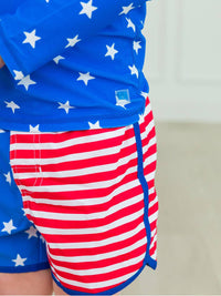 Rufflebutts - Boys Stars & Stripes Dolphin Hem Swim Trunks