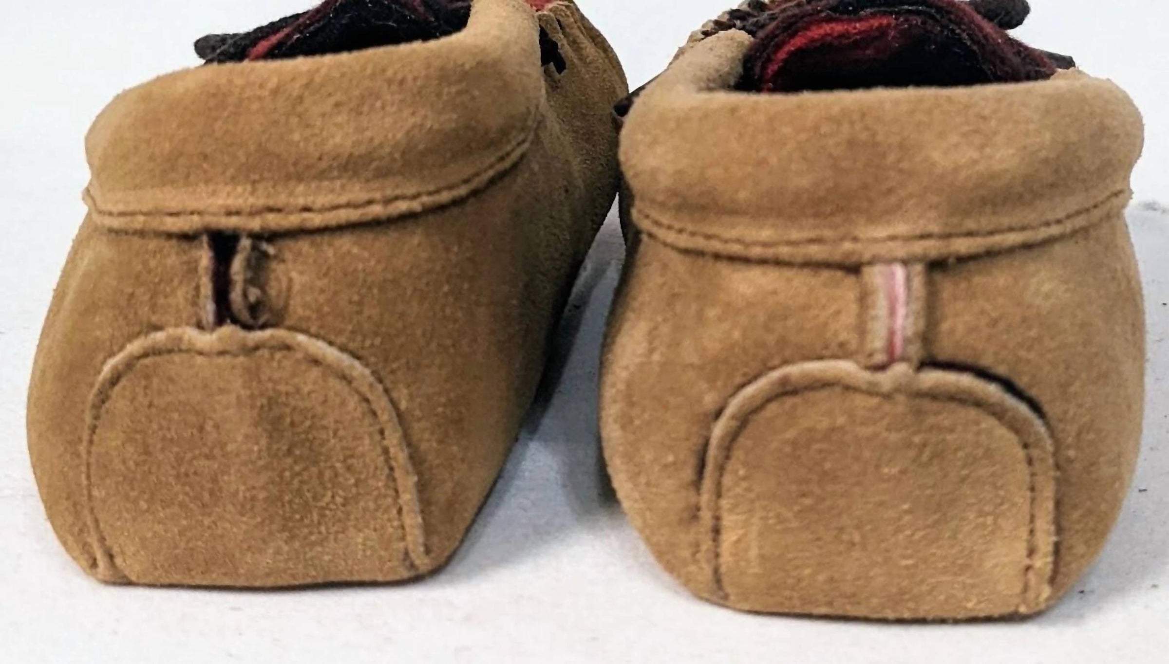 MINNETONKA Kids Moccasin Shoes in tan - kids' shoe - detail view
