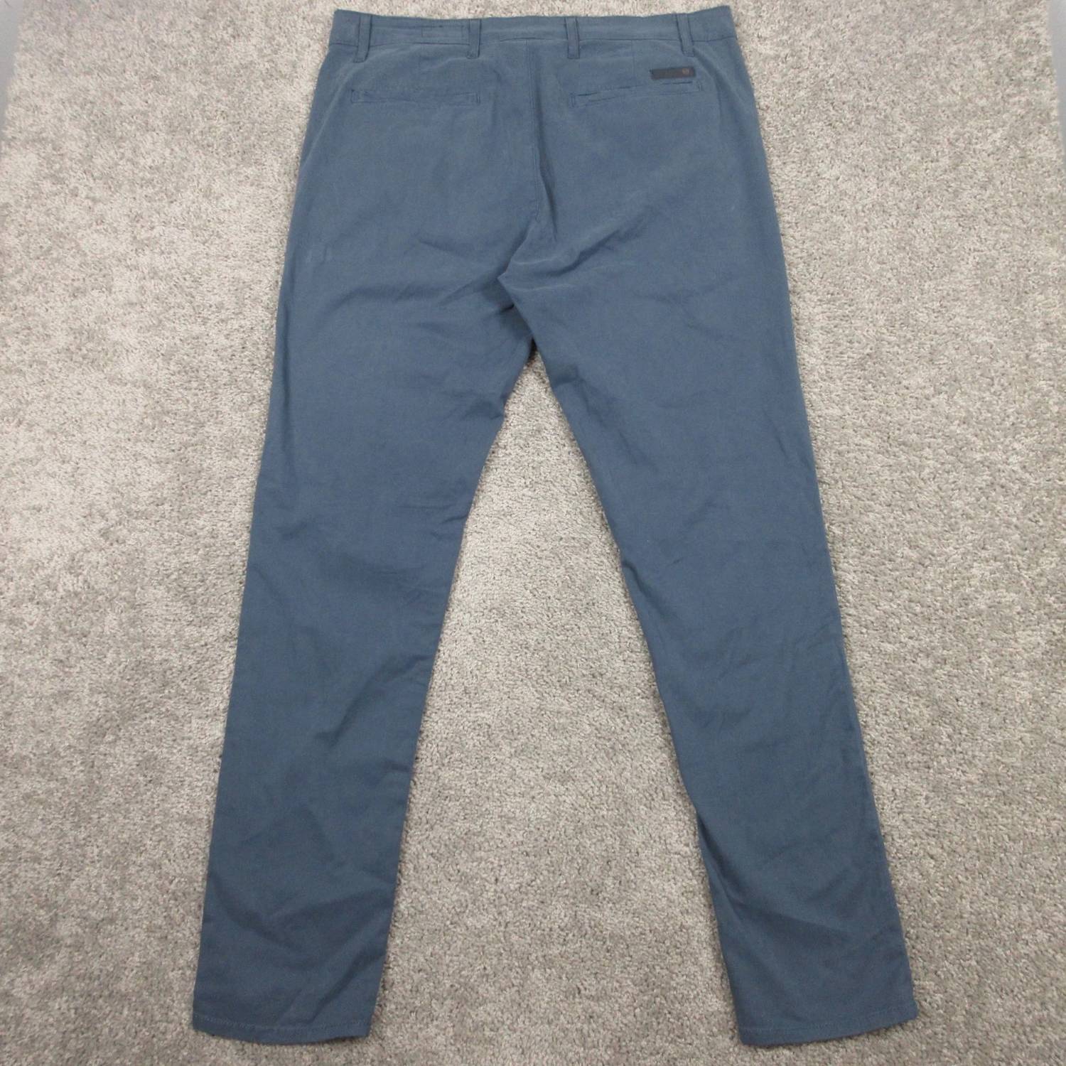 AG Jeans Men's Jamison Skinny Leg Chino Pants in blue - men's pants - detail view
