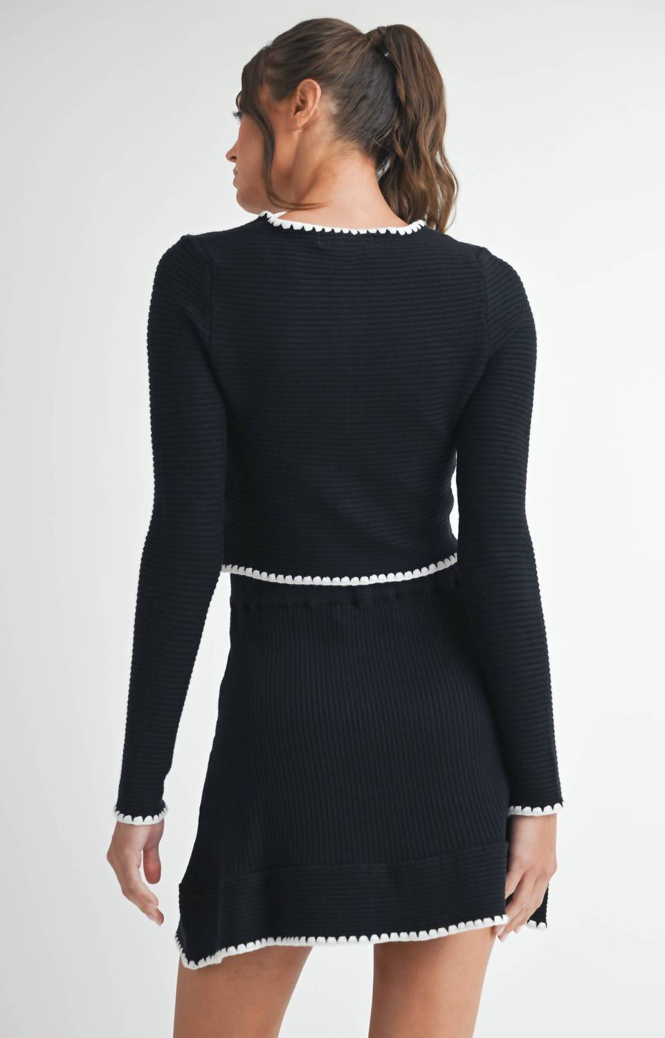 ENDLESS BLU. Contrast Button Knit Crop Jacket in black off white - women's jacket - detail view