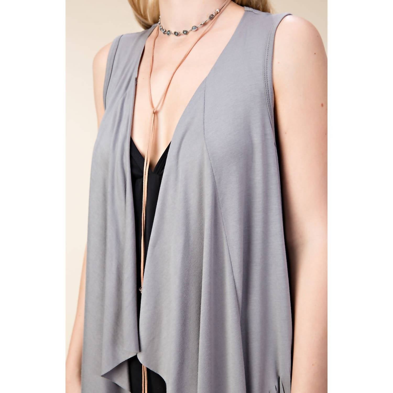 Vocal Apparel - Open Front Draped Vest With Fringe Hem And Bullhead Print