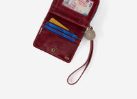 HOBO Women's Coin Wristlet Wallet in aniline garnet gloss - women's bag - detail view