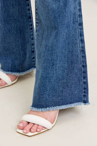 Judy Blue - Mid Rise Vintage Wash Flare Jeans With Distressed And Fray Hem