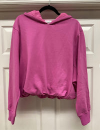 Things Between Bubble Hem Hoodie in bubblegum pink - women's top - detail view
