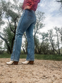 Rock & Roll Denim Raw Side Seam Modern Bootcut Jeans in medium wash - women's jeans - detail view