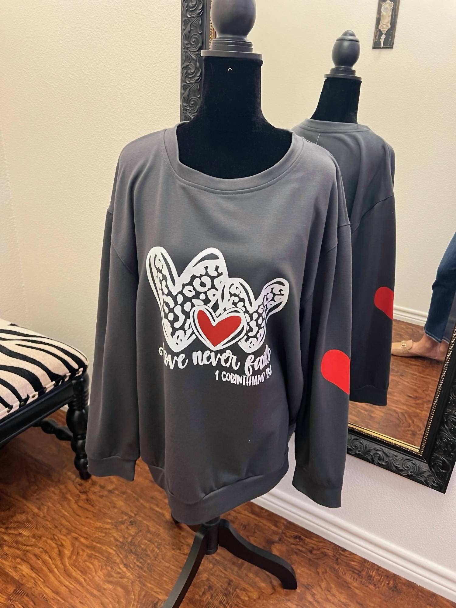 Unishe - Women's Love Never Fails Sweatshirt