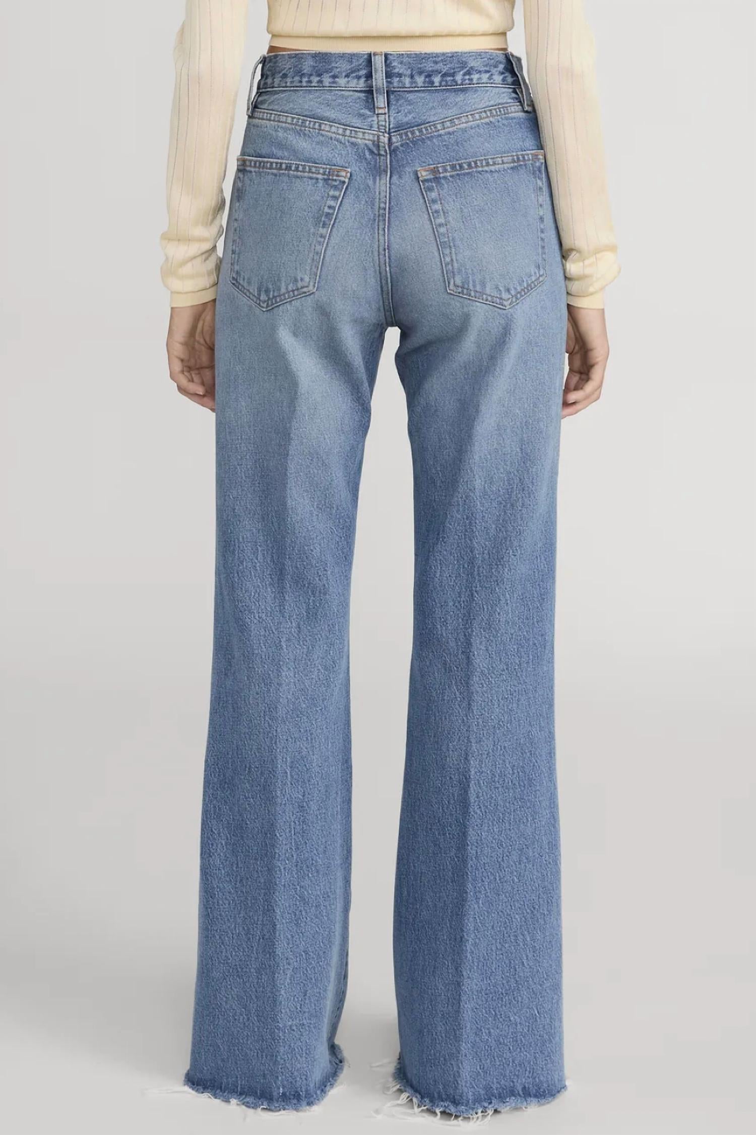 FRAME Lax Wide Leg Flare Jeans in numeral raw fray - women's jeans - detail view