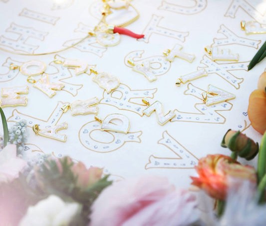 Asha - Mini Letter Charm - V