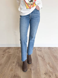 DAZE Kea Dark Raw Hem Crop Bell Jeans in blue - women's jeans
