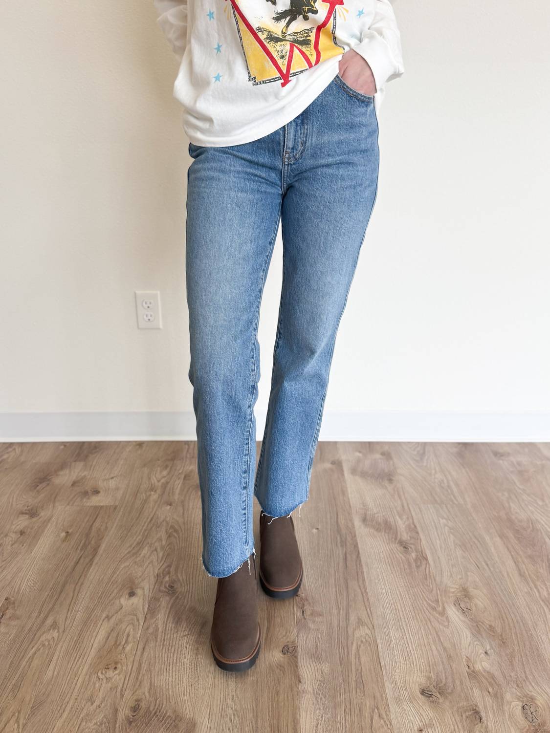 DAZE Kea Dark Raw Hem Crop Bell Jeans in blue - women's jeans