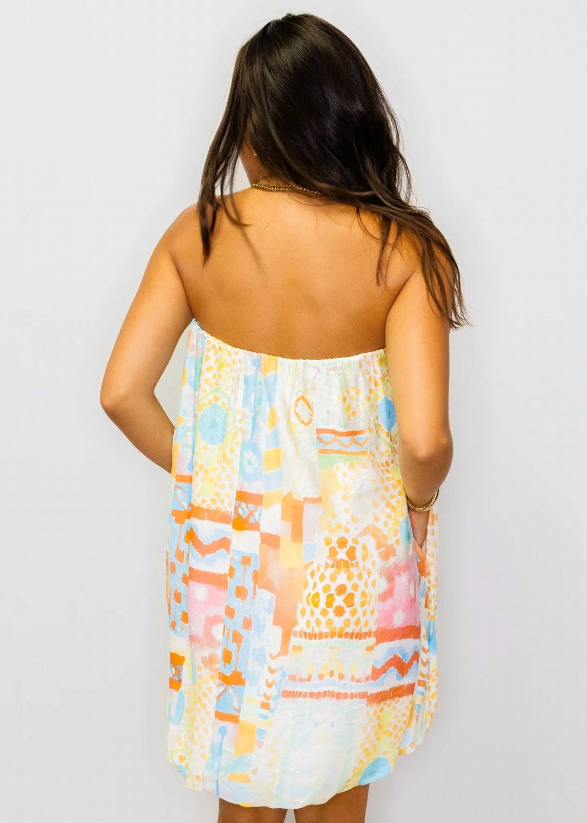 Cozy Co. - Watercolor Bubble Hem Strapless Mini Dress
