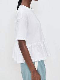 The Great. - The Oversized Ruffle Peplum Tee