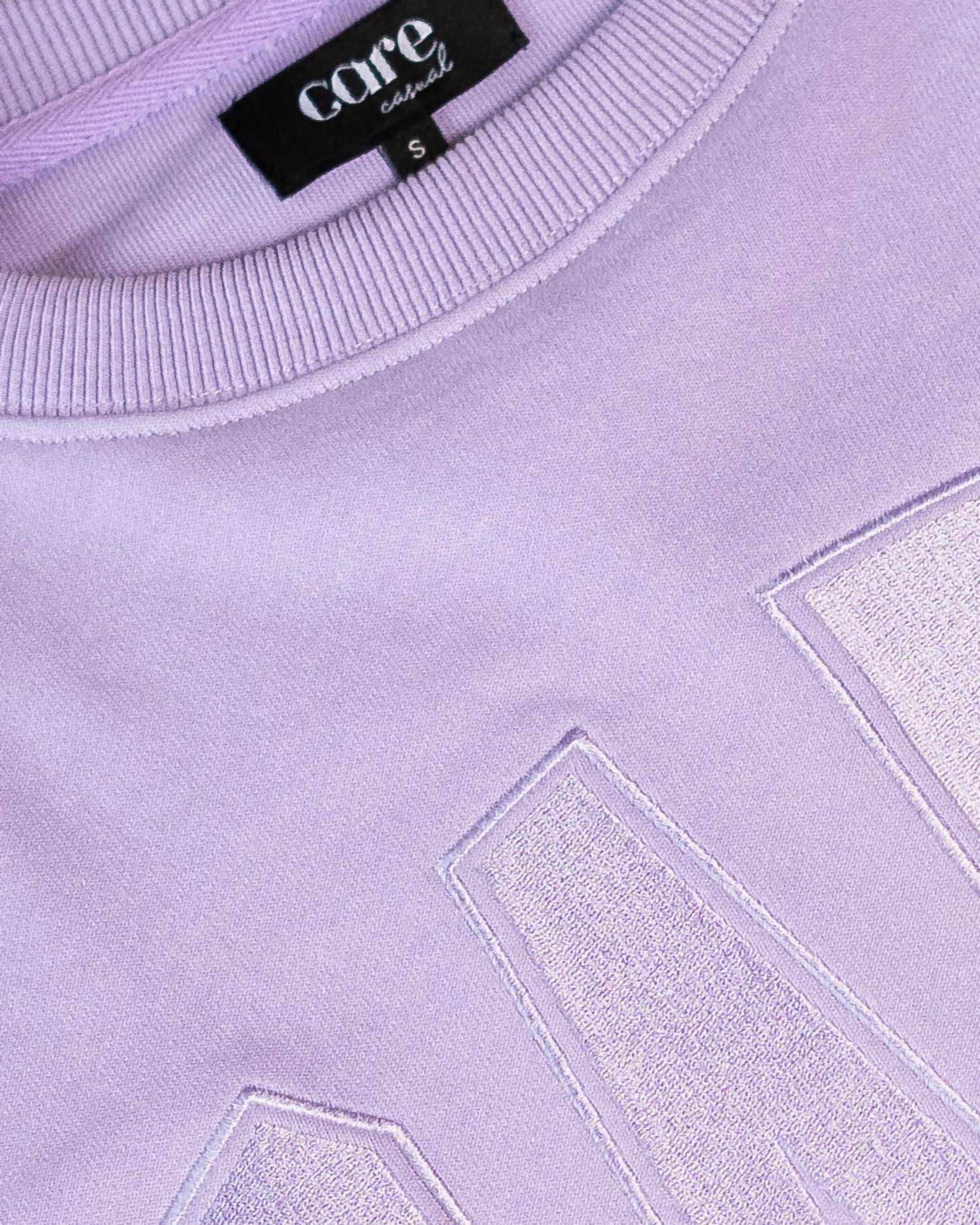 Care Tucker - 90’s Baggy Care Crewneck Sweatshirt