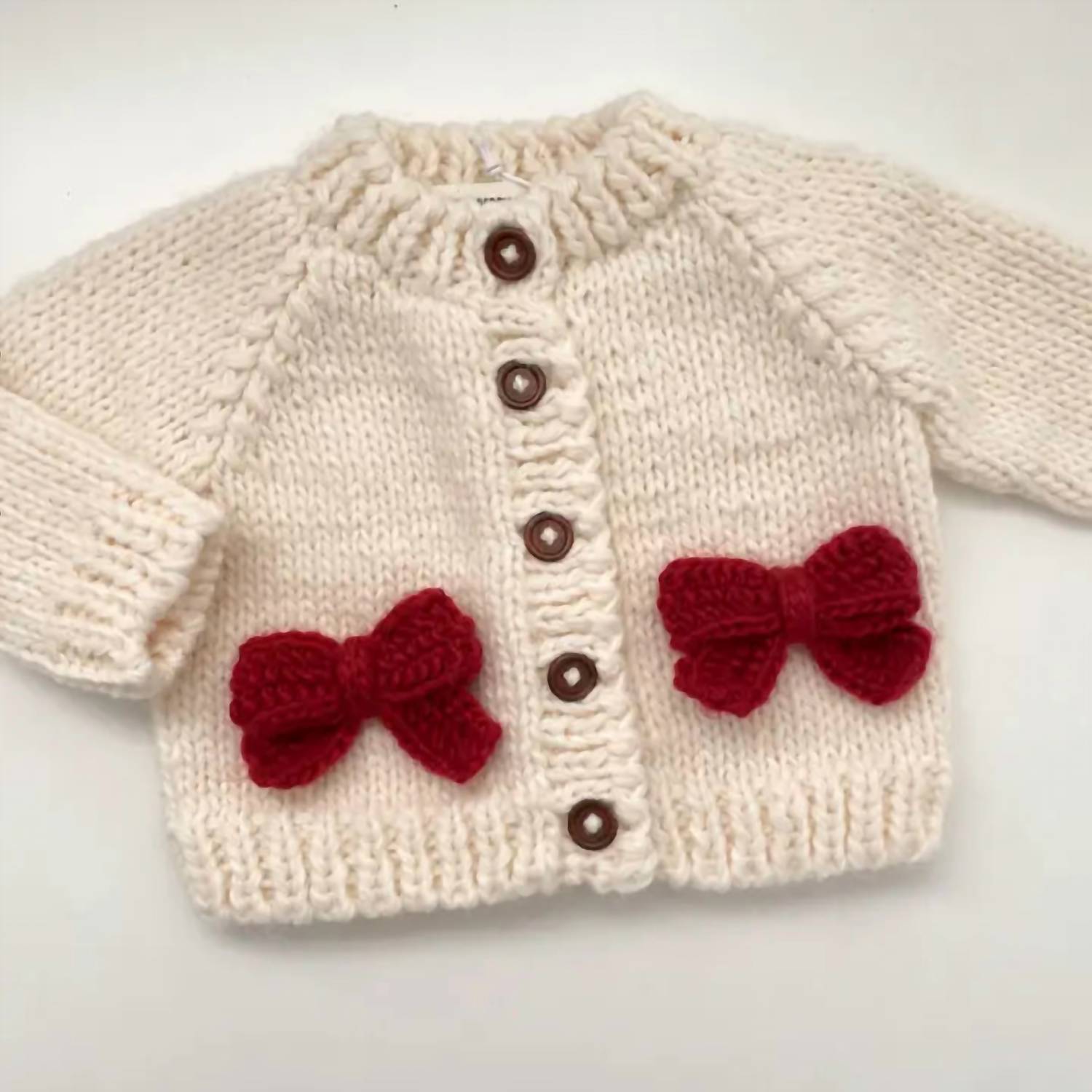 The Blueberry Hill Kid's Cozy Knit Cardigan With Bow in cream red - kids' sweater - view 4