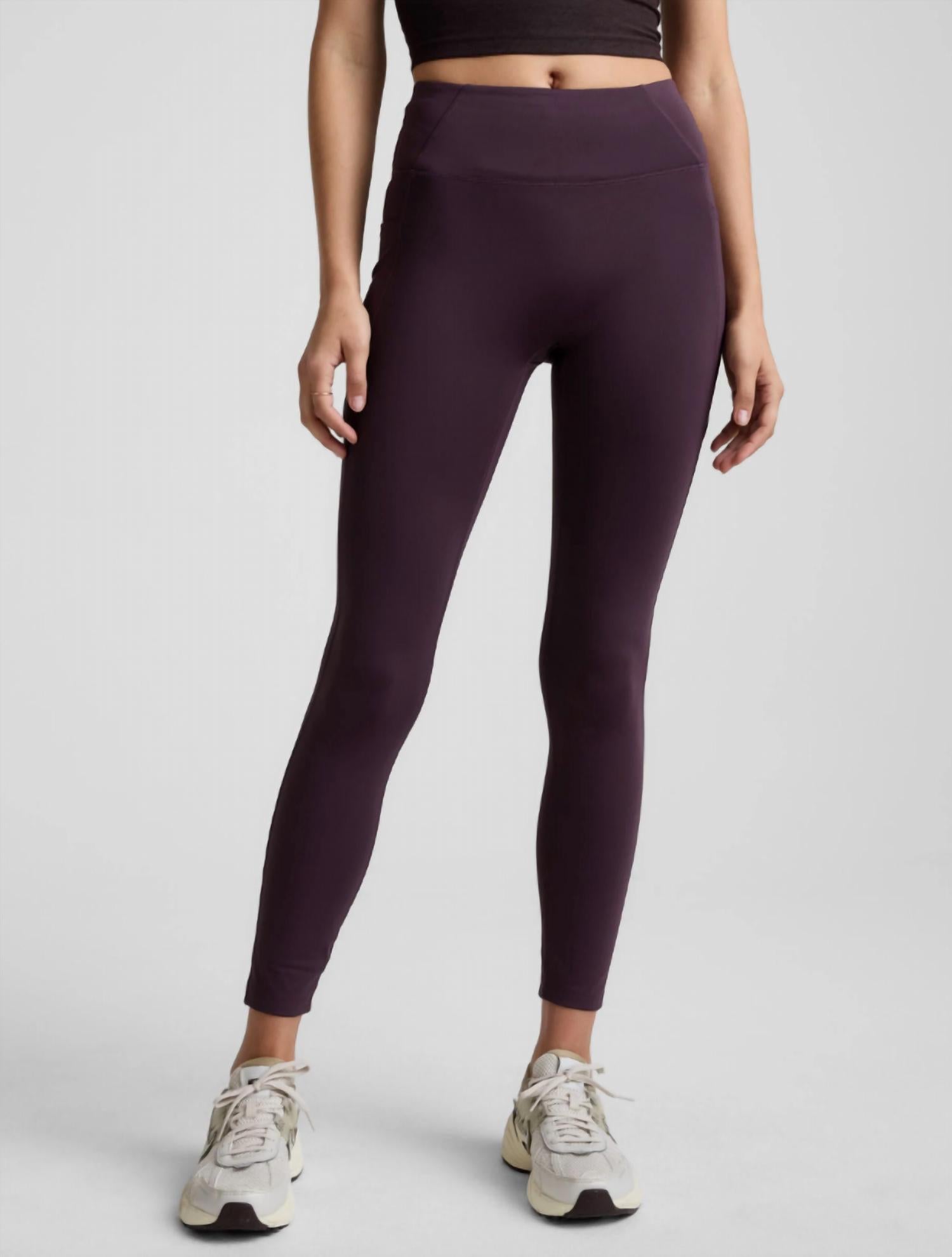 BEYOND YOGA pacer fleece zip pocket long legging in eggplant - women's pants - detail view