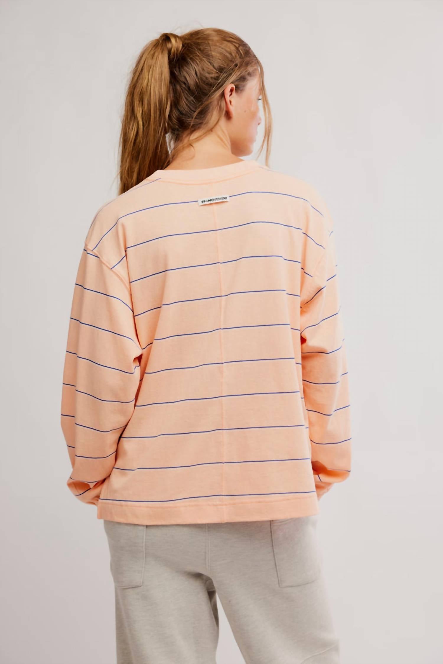 fp movement Hustle Striped Layer Top in awning stripe peach - women's long sleeve top - detail view