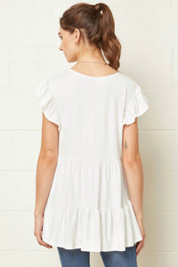 entro Tiered Ruffle Babydoll Top in ivory - women's blouse - detail view