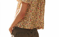 THE GREAT. Women's The Bungalow Top in floating petals floral - women's blouse - detail view