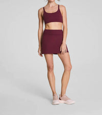 Spanx Onform Lightweight Skort in plum berry - women's shorts