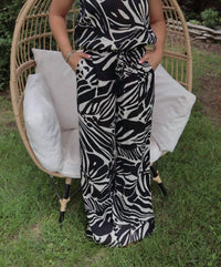 ELAN Rio Strapless Jumpsuit in black and off white tropical print - women's pants