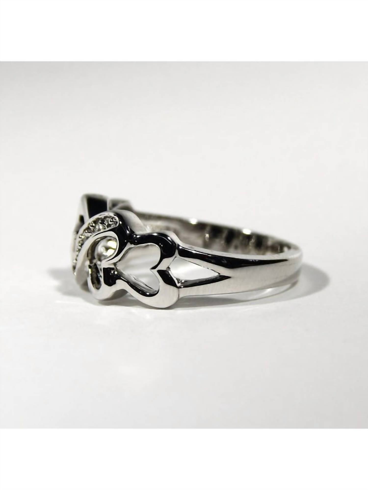 FAIRE Rhodium Plated CZ Four Mini Heart Ring in silver - women's jewelry - detail view