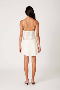 NIA Tiny Dolphin Hem Skort in ecru - women's shorts - detail view