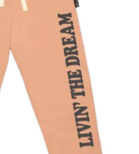 TINY WHALES Kids' Livin The Dream Sweatpants in coral - kids' joggers - detail view