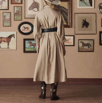 THE GREAT. Western Embroidered Herd Dress in soft tan with cream embroidery - women's dress - detail view