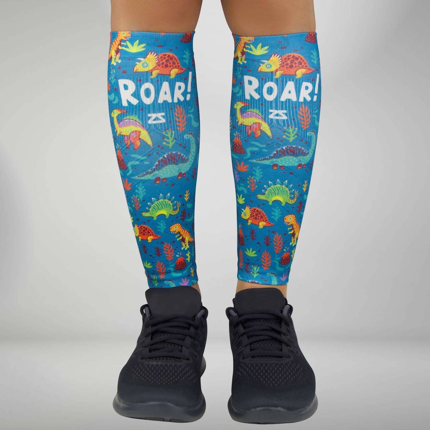 Zensah Print Compression Leg Sleeves in dinosaurs teal - men's item - alternate view
