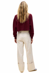 DAYDREAMER Elton John Yellow Brick Road Sweatshirt in dark cherry - women's sweater - detail view