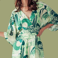 Big Hit Fashion - Elsie Open Back V-neck Tie Floral Jumpsuit