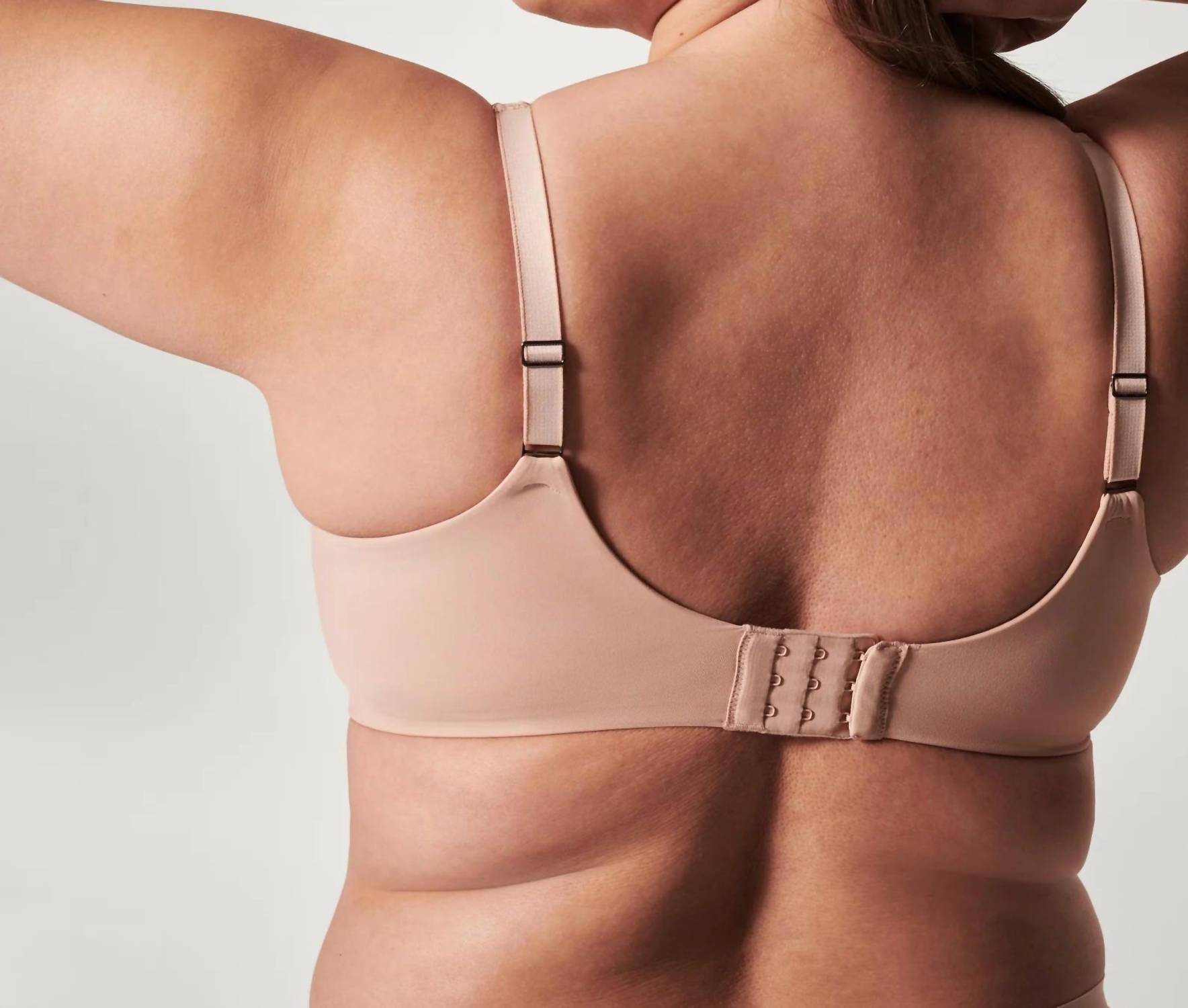 Spanx Low Profile Minimizer Bra in champagne beige - women's intimate - detail view
