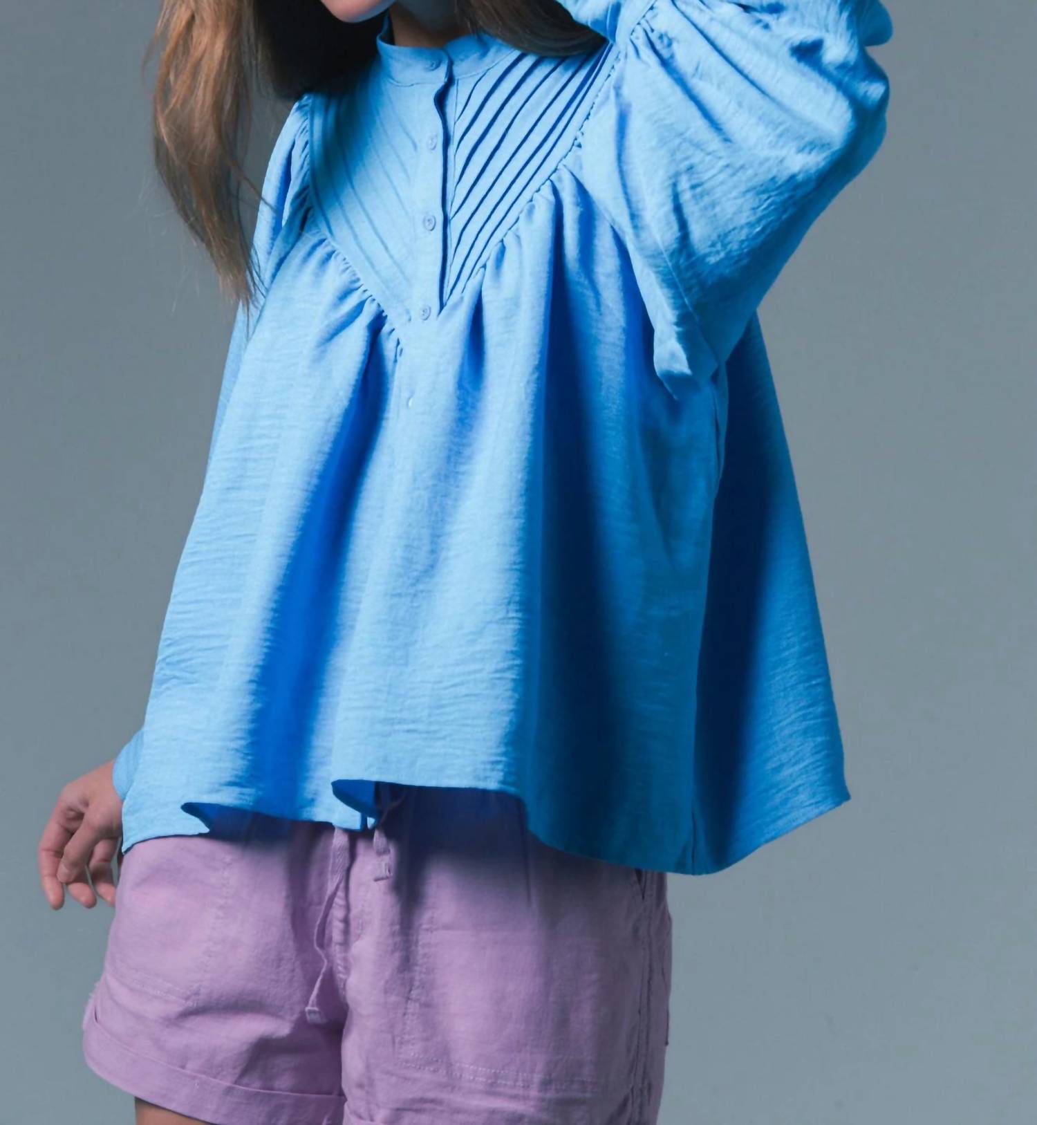 THE SHIRT The Shiv Ruffled Shirt in cornflower blue - women's blouse - detail view