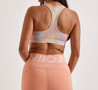 NIKE Women's Dri-FIT Medium Support Sports Bra in multicolor - women's intimate - detail view