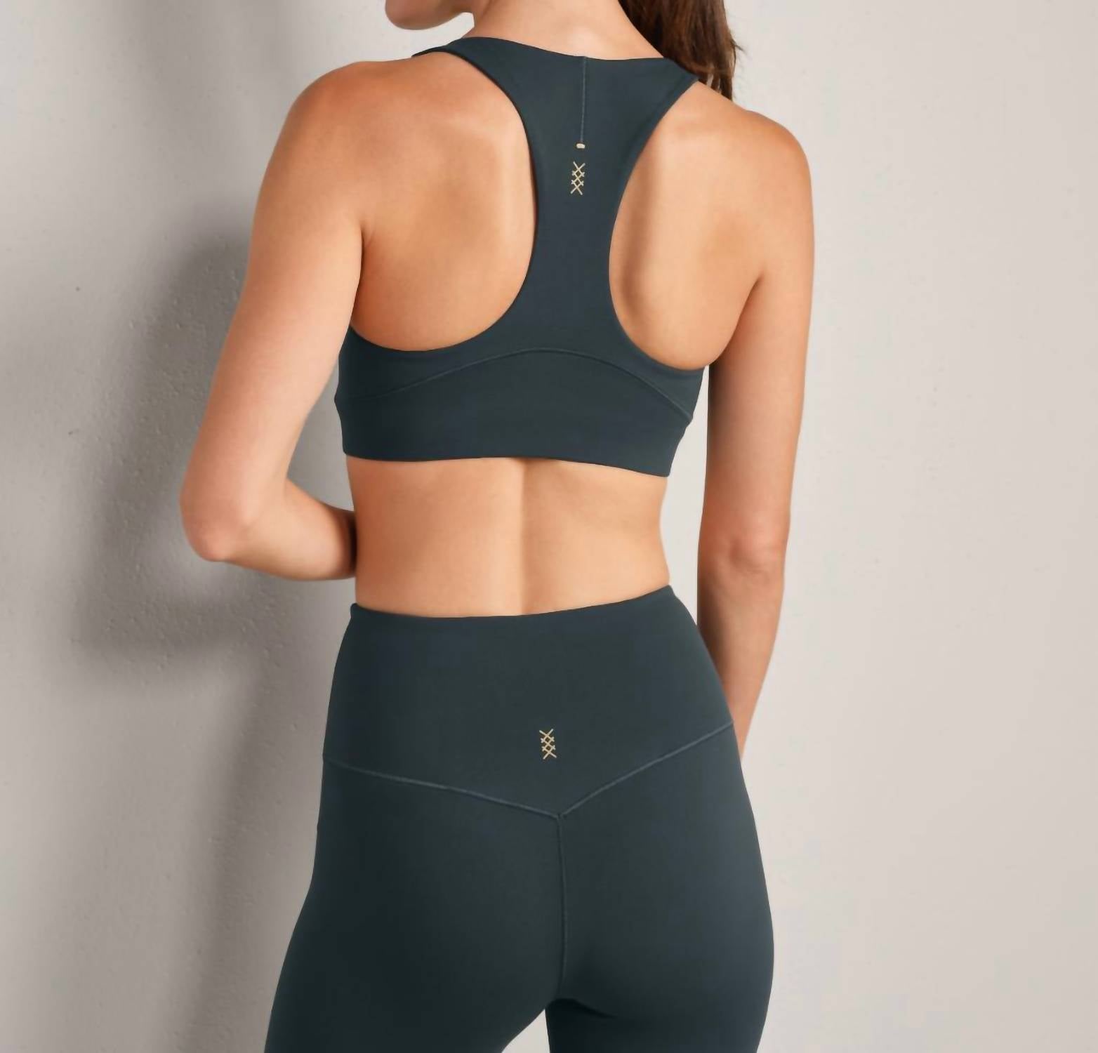 RHONE Revive Sport Bra in wild forest - women's intimate - detail view