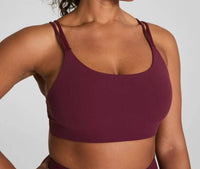 Spanx Low Impact Sports Bra in plum berry - women's intimate - detail view