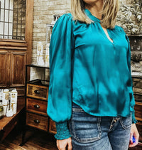 Velvet Heart Twist Neck Long Sleeve Blouse in teal - women's blouse - detail view