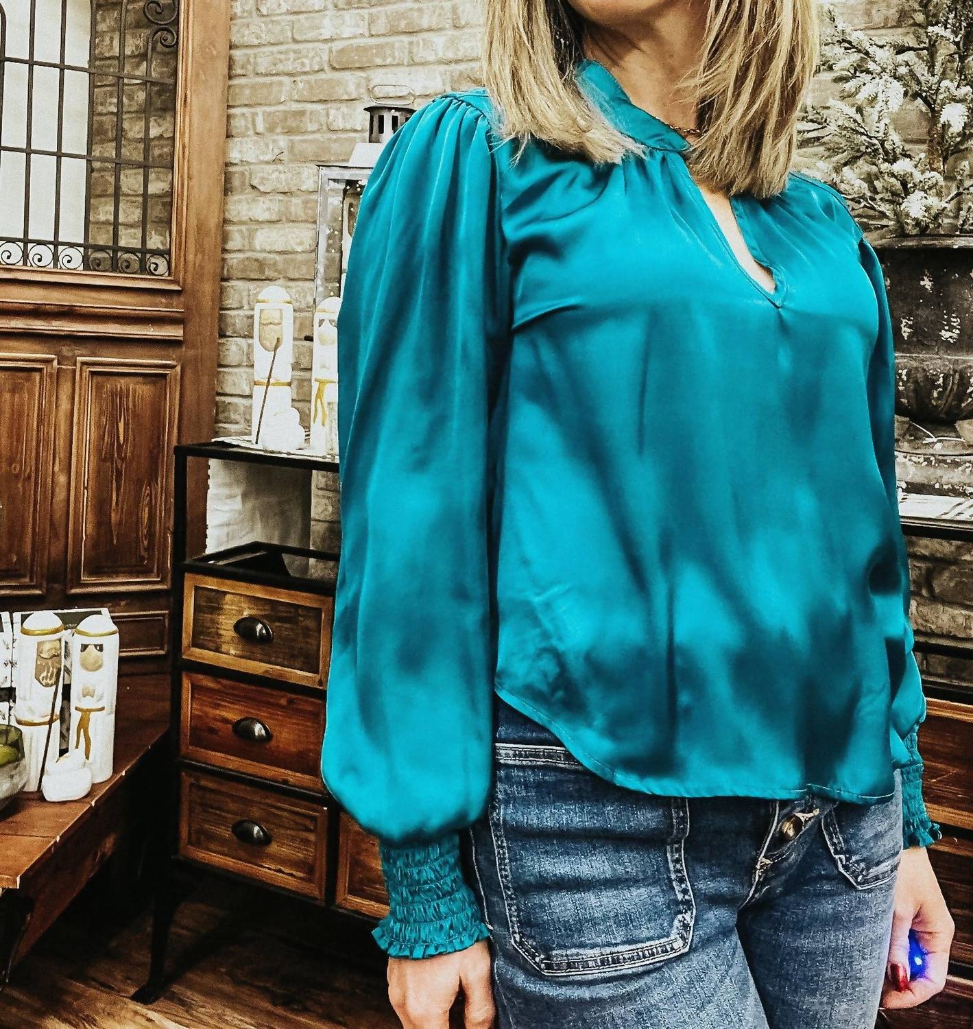 Velvet Heart Twist Neck Long Sleeve Blouse in teal - women's blouse - detail view