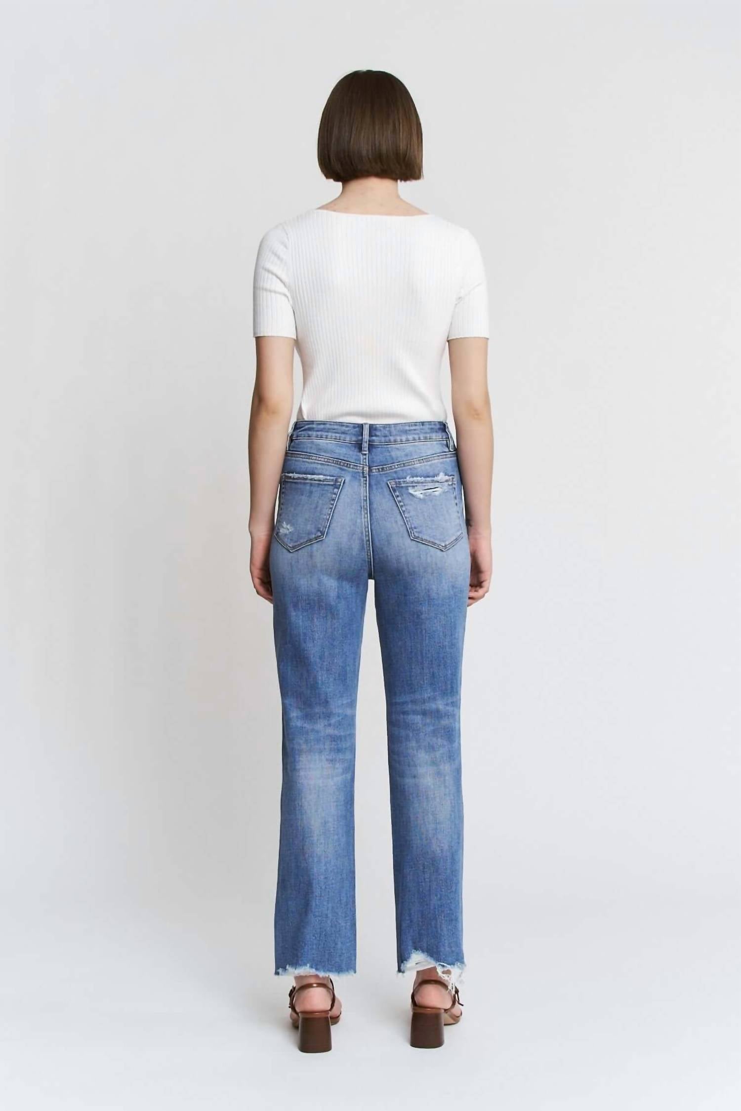 mica denim High Rise Raw Hem Loose Fit Straight Leg Jeans in meduim wash - women's jeans - detail view